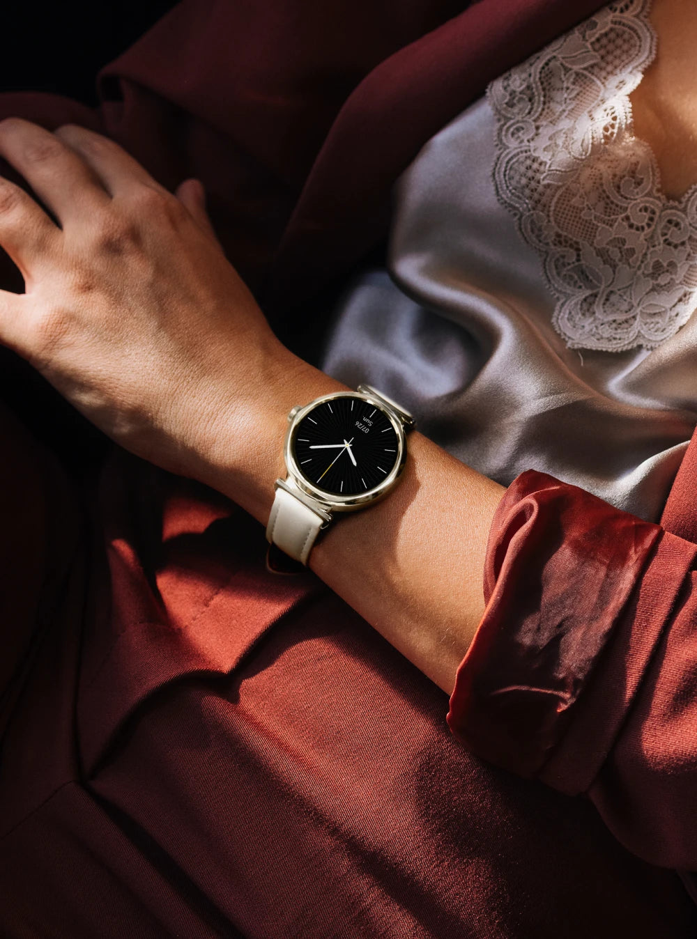 Runmefit GRACE Smart Watch for Women elegantly displayed on wrist with stylish attire.